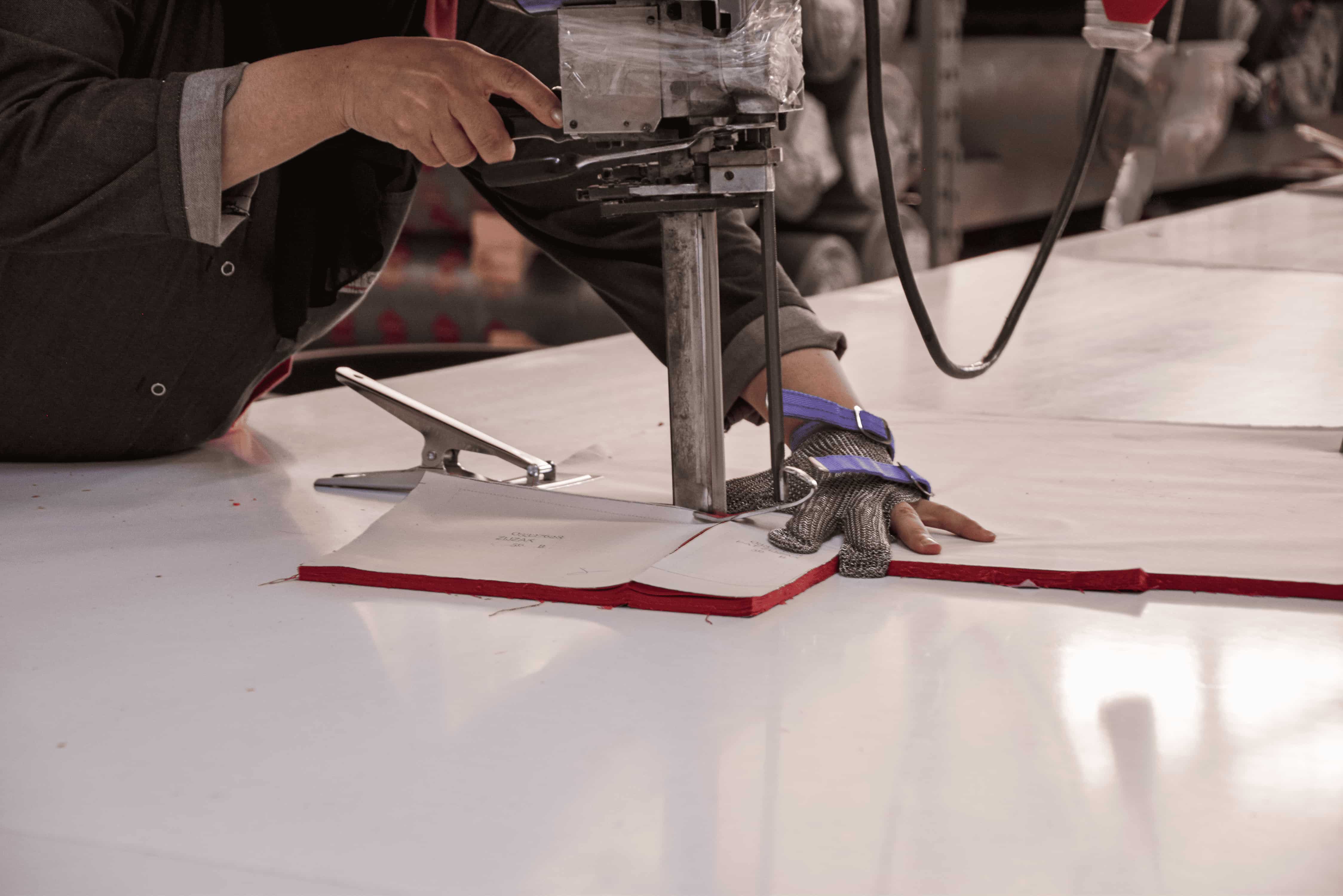 Professionals in safety gear working at an industrial site