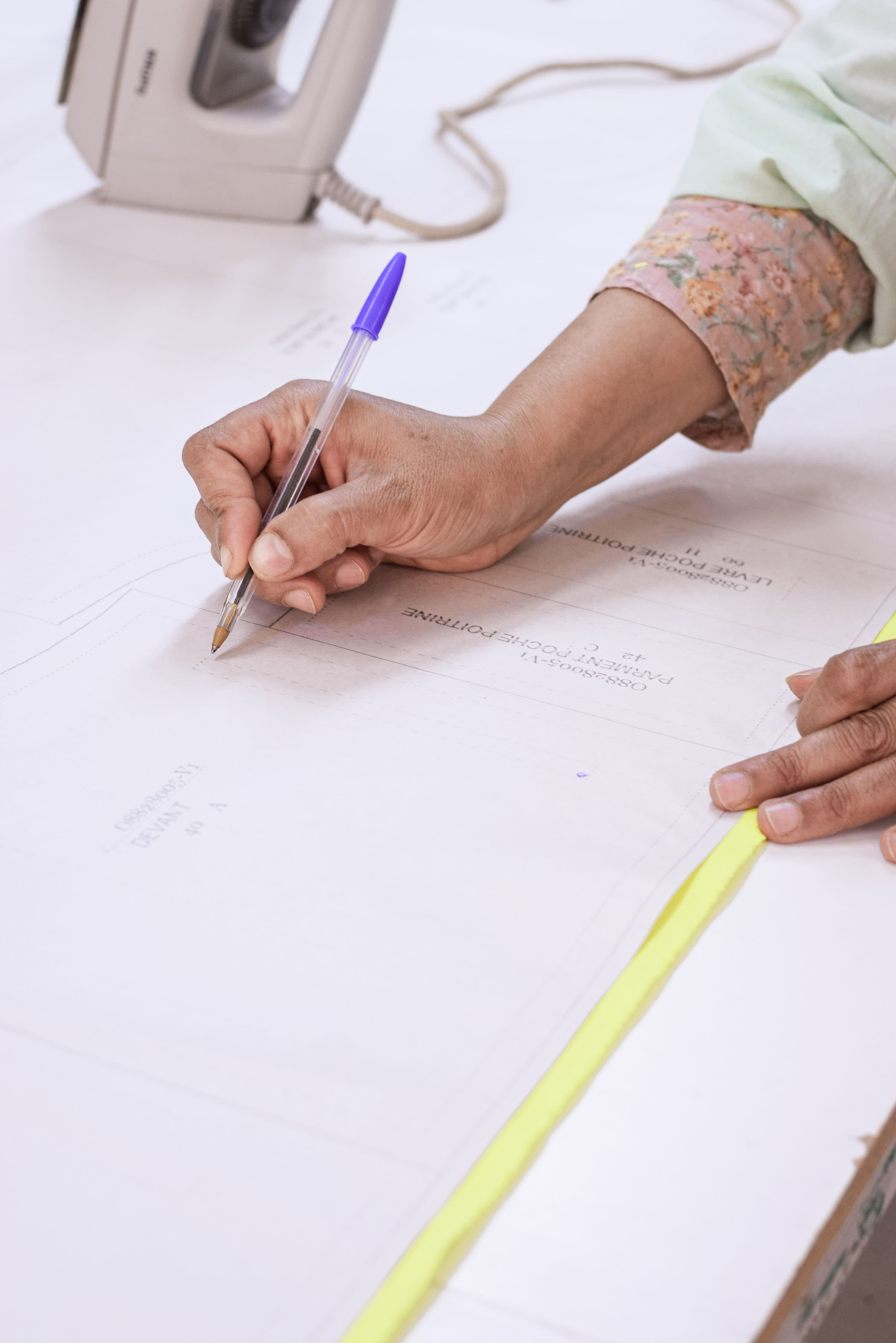 Professionals in safety gear working at an industrial site